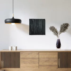 Textured Art Nighttime Sheets black framed on a white wall over a wooden livingroom board