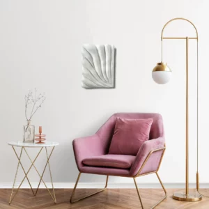 Textured Art Venus on a white wall over a art deco desk and an pink chair