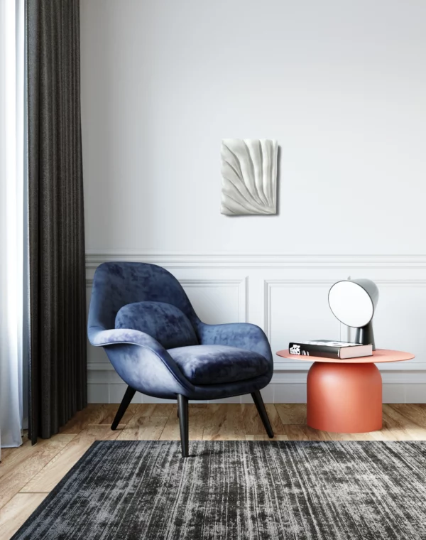 Textured Art Venus on a white wall over a blue chair